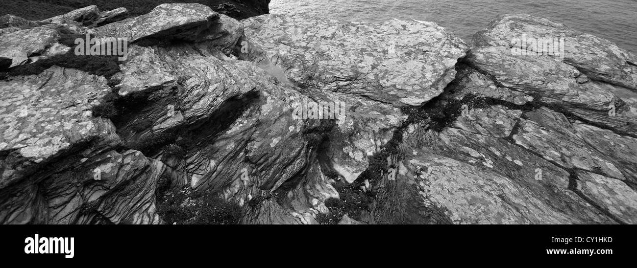 Rugged shoreline, Port Isaac Bay near Tintagel town, Cornwall County, England, UK Stock Photo