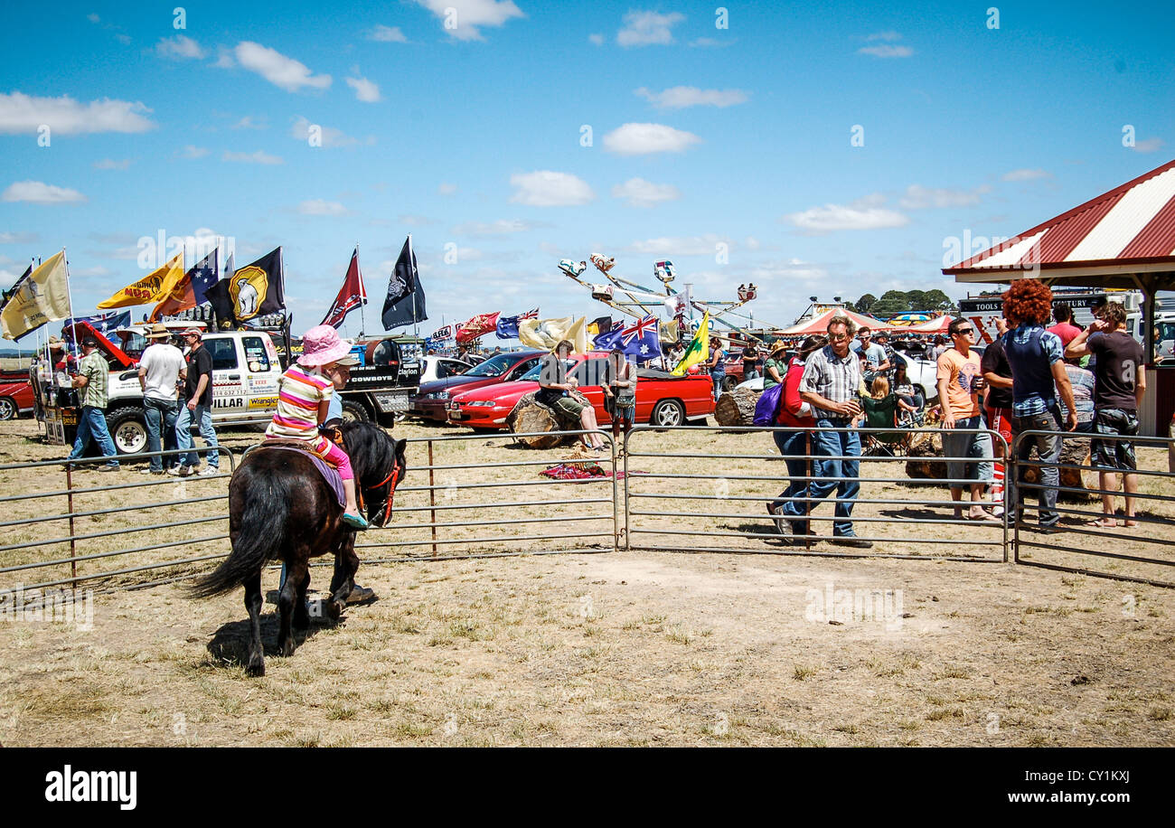 Pony ride at annual rural fair Clunes Show in Clunes, Victoria, Australia. Stock Photo