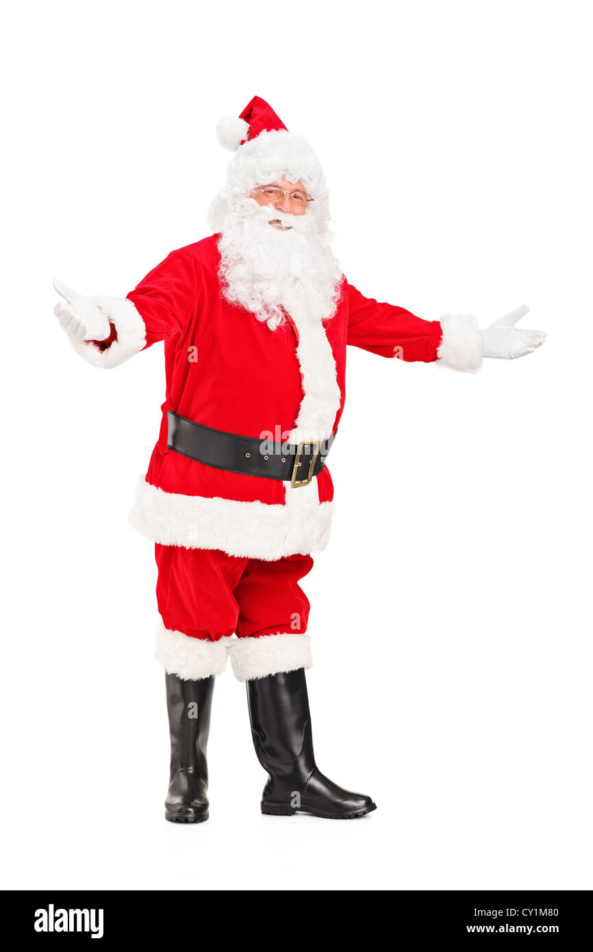 Full length portrait of a happy Santa Claus gesturing welcome isolated ...