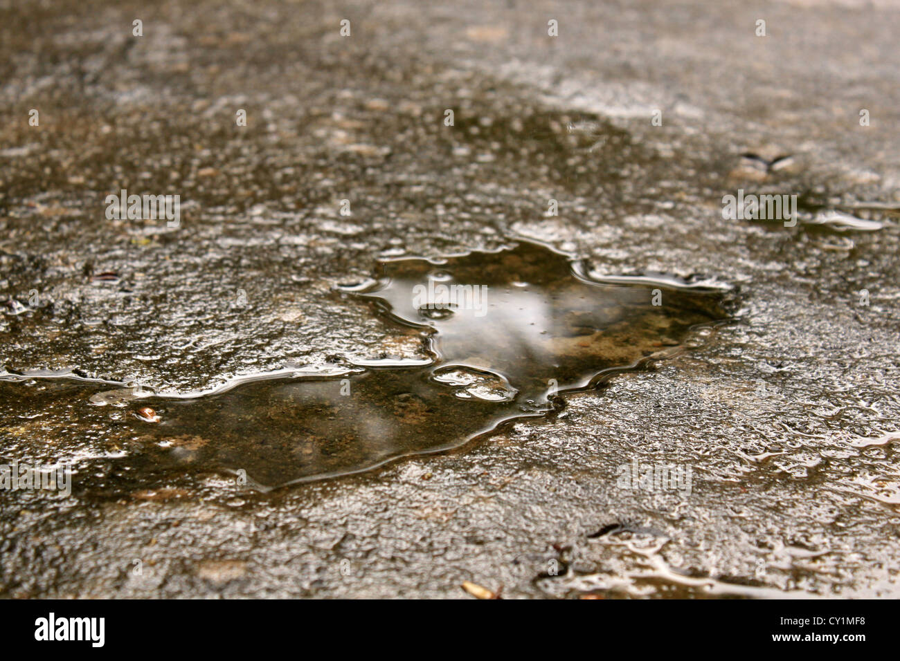 clogged rain water on cement floor Stock Photo Alamy