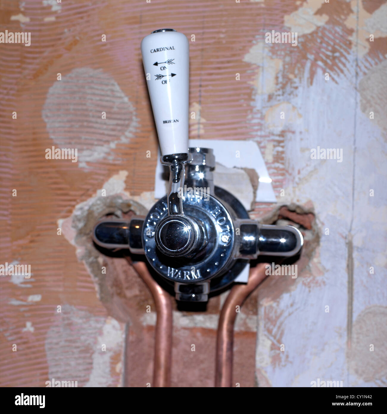 Installing Shower Control in New Bathroom Stock Photo Alamy