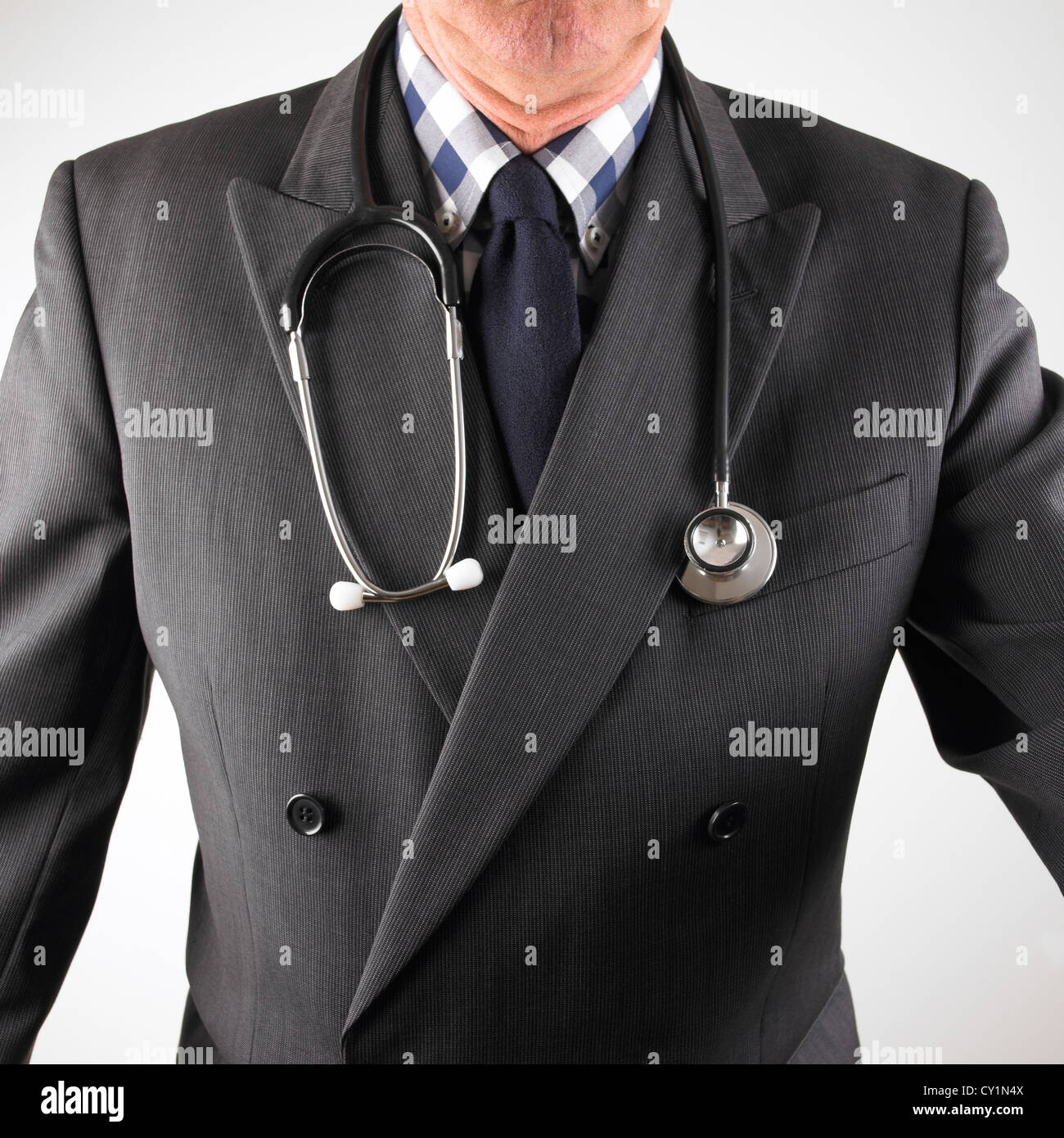Medical consultant wearing smart suit with stethoscope around neck
