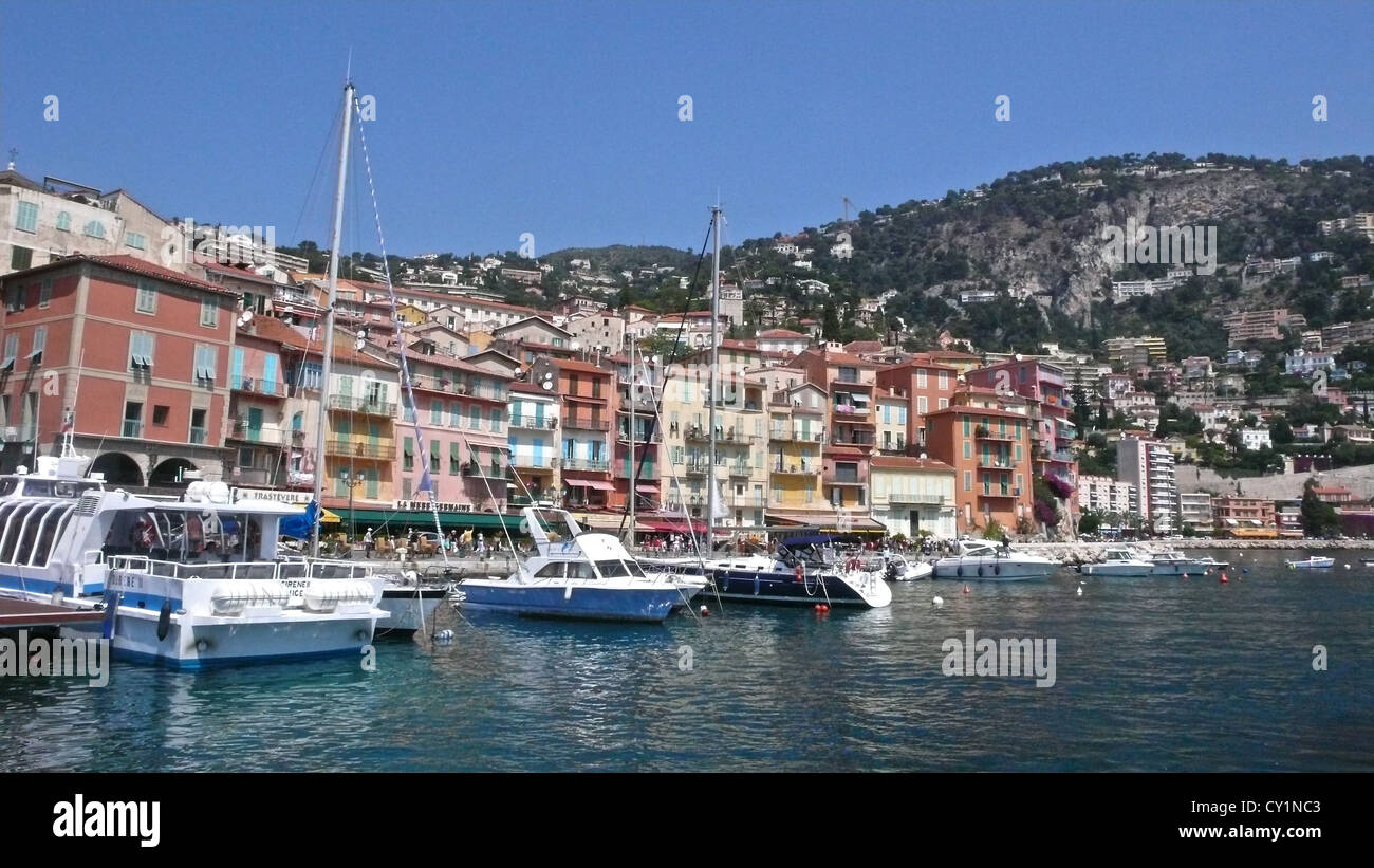 A multitude of boats crowd the beautiful harbor of Villefranche. Stock Photo