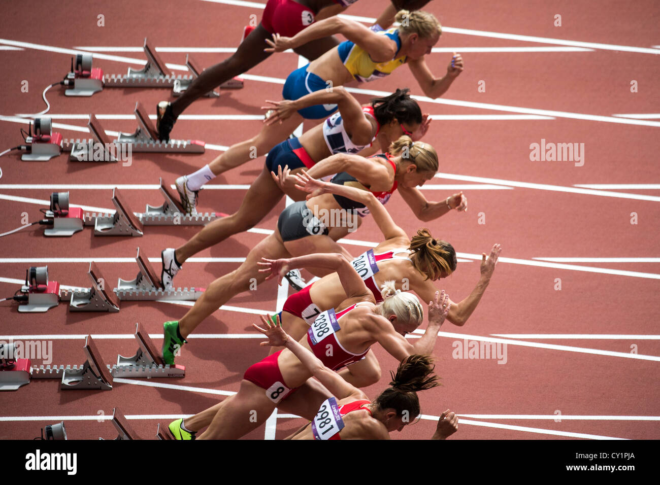 Start of women's heptathlon 100m race at the Olympic Summer Games, London 2012 Stock Photo