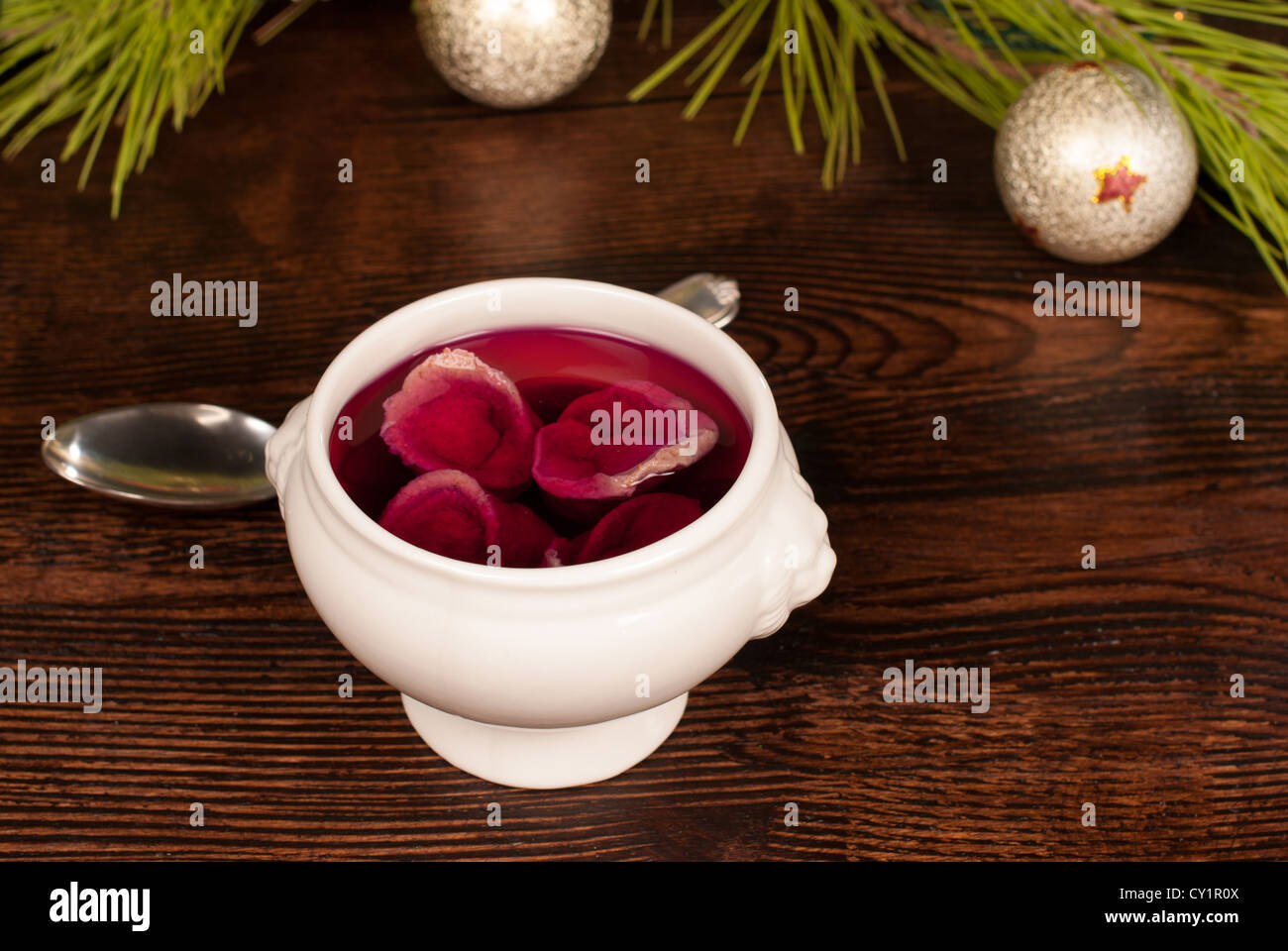 Traditional Christmas beetroot soup with festive decoration Stock Photo