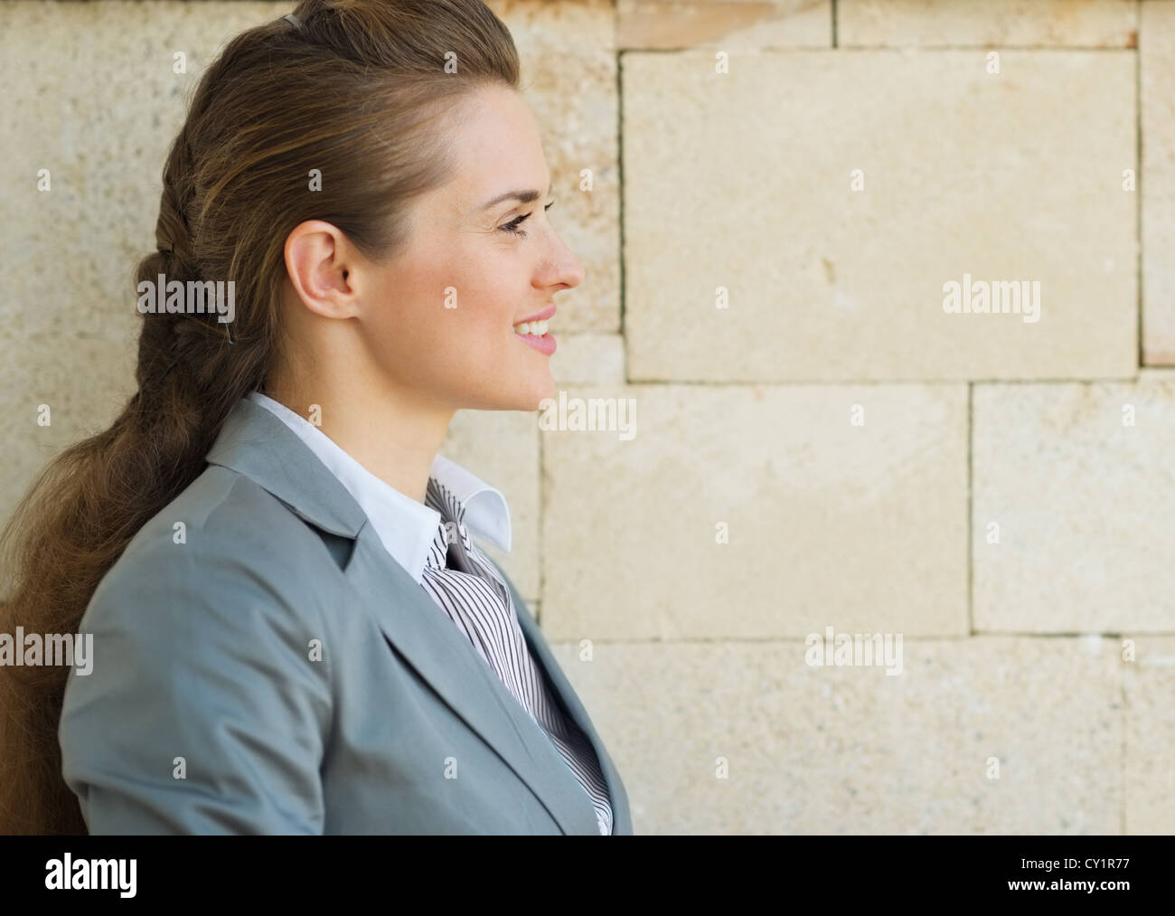 Profile portrait of happy business woman looking on copy space Stock ...