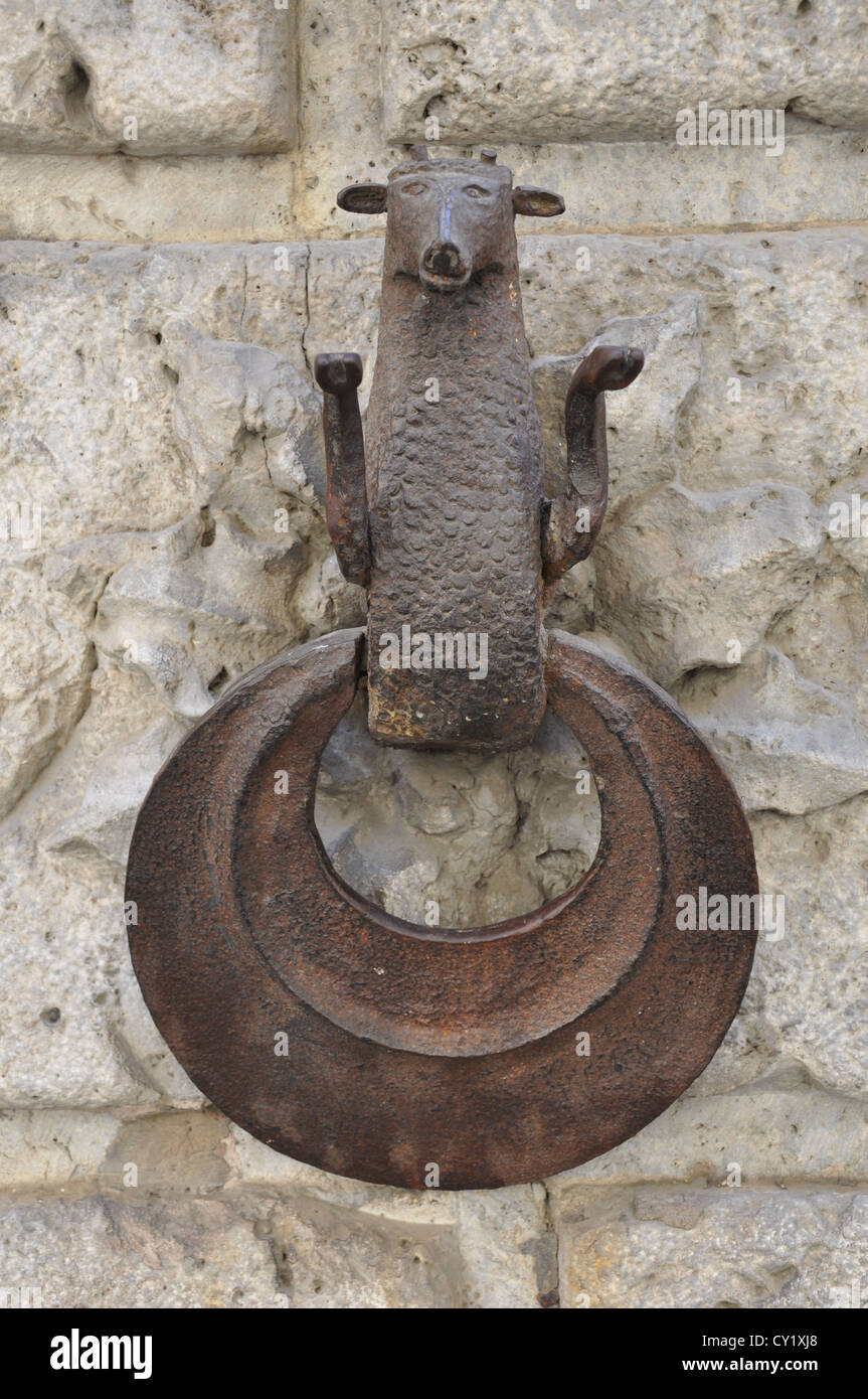 Forged decorative wall bracket knocker Stock Photo