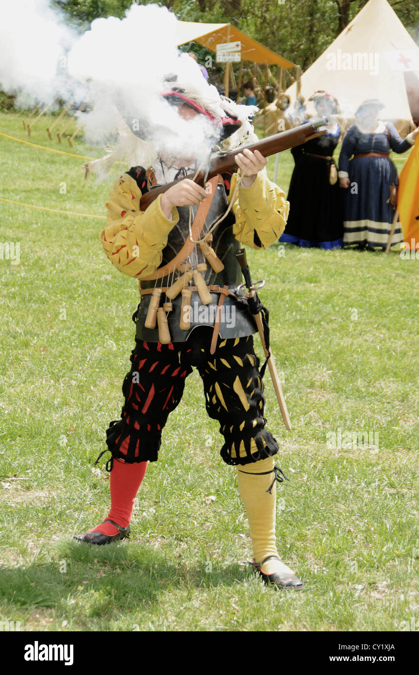 man shoots a gun during a reenactment of pirate times in Glendale, Maryland Stock Photo