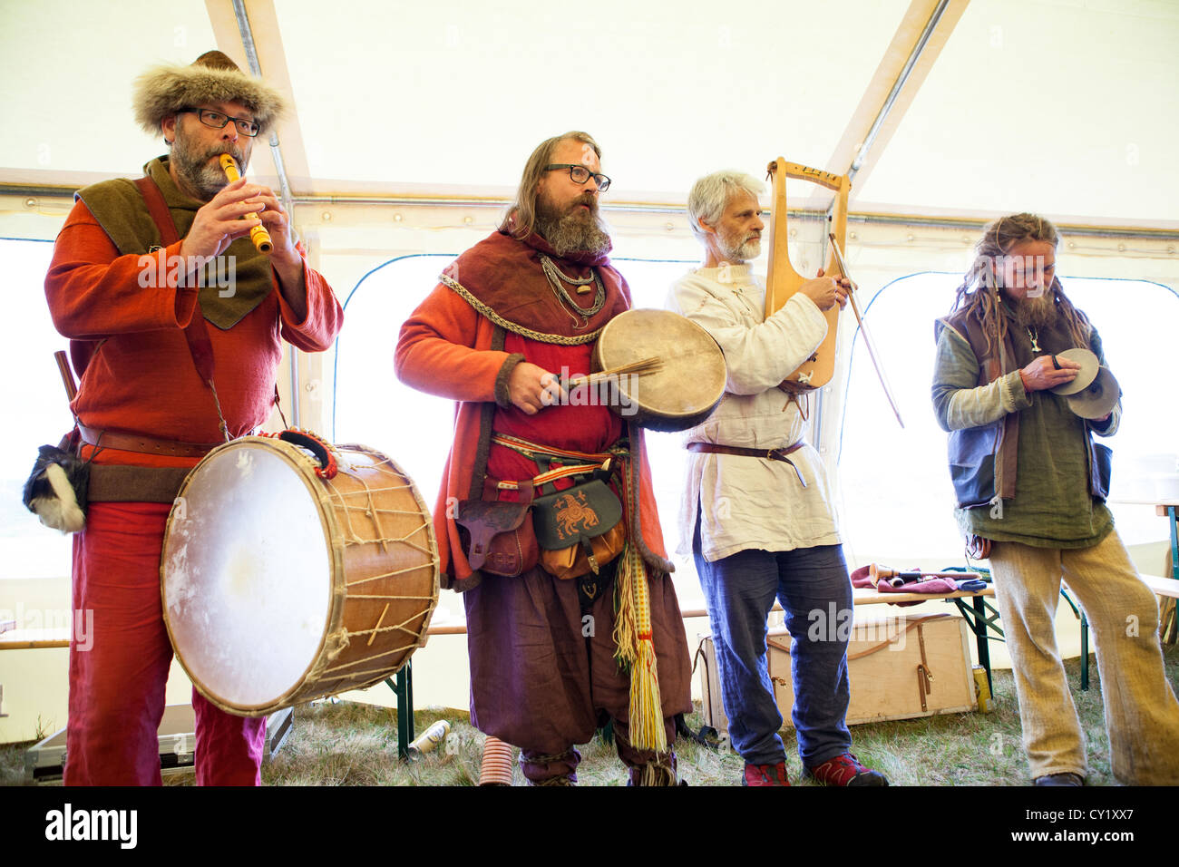 Musicians play during a gathering of an old Norse gods religious sect in Thingvellir in Iceland. Stock Photo