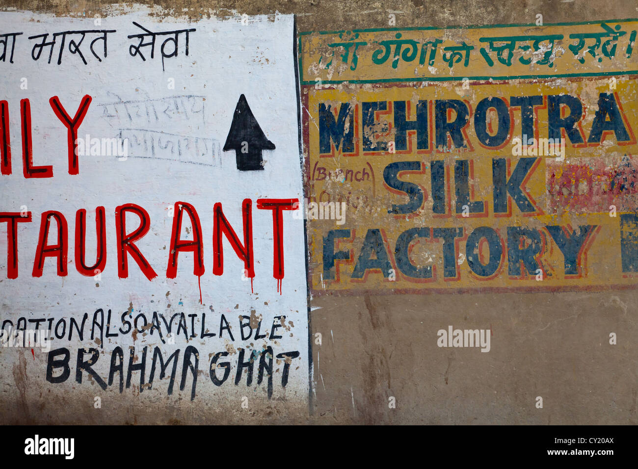 Advertisement Signs on a Wall at the Ghats in Varanasi, India Stock ...