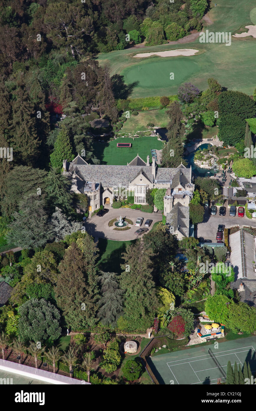 Just off Sunset Boulevard is the Playboy Mansion in the luxurious Holmby Hills region of Los Angeles. Stock Photo