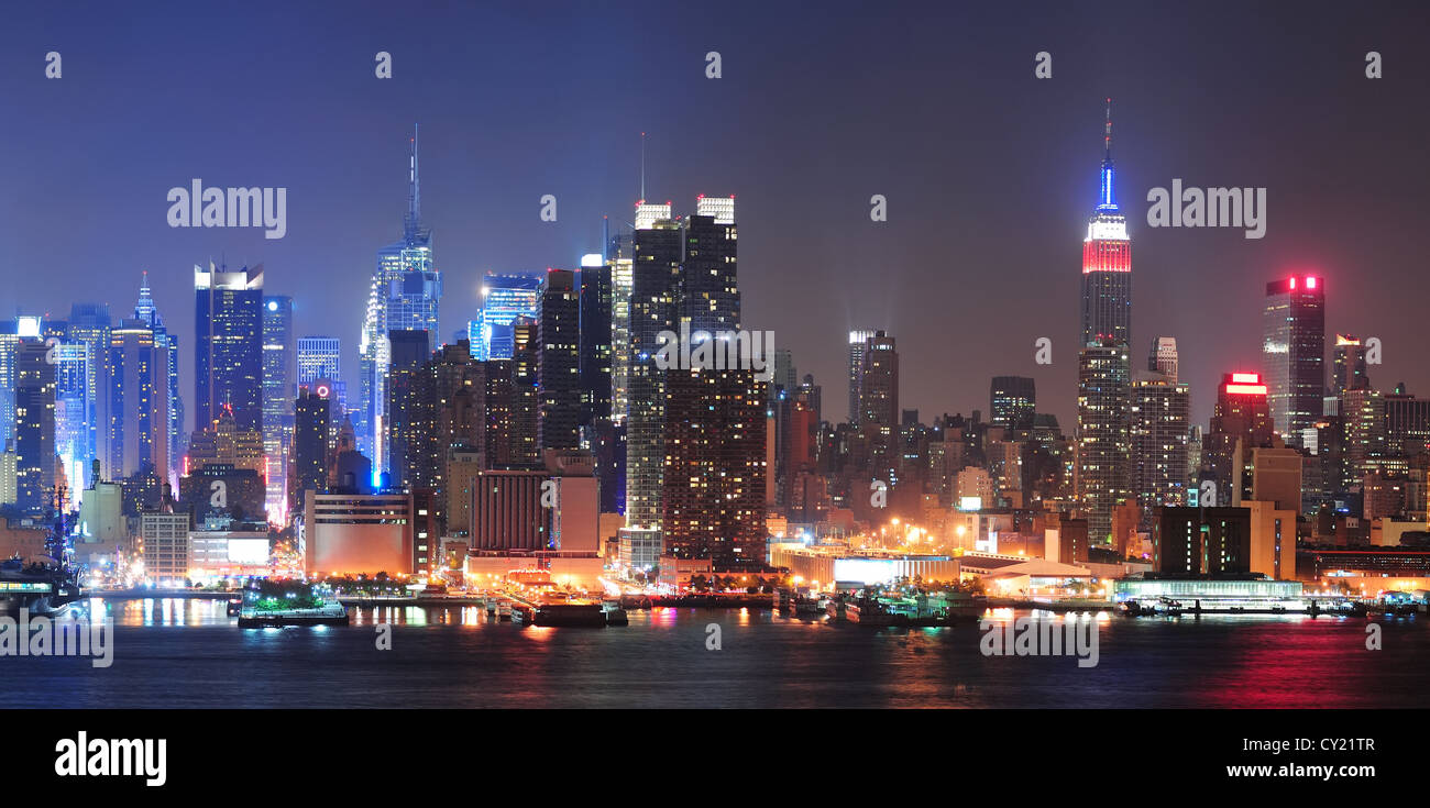New York City Manhattan midtown skyline at night with skyscrapers lit ...