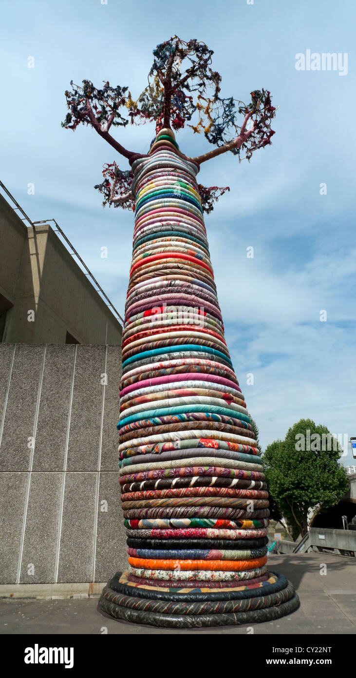 'Under the Baobob Tree'  textile sculpture of coils wrapped around a tree outside the Royal Festival Hall, South Bank London England UK   KATHY DEWITT Stock Photo