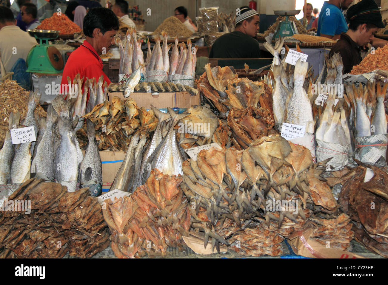 Dried fish seller at the Central Market, Sandakan waterfront, Sabah