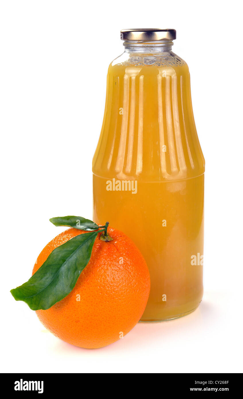 orange fruit and a bottle of juice on a white background Stock Photo Alamy