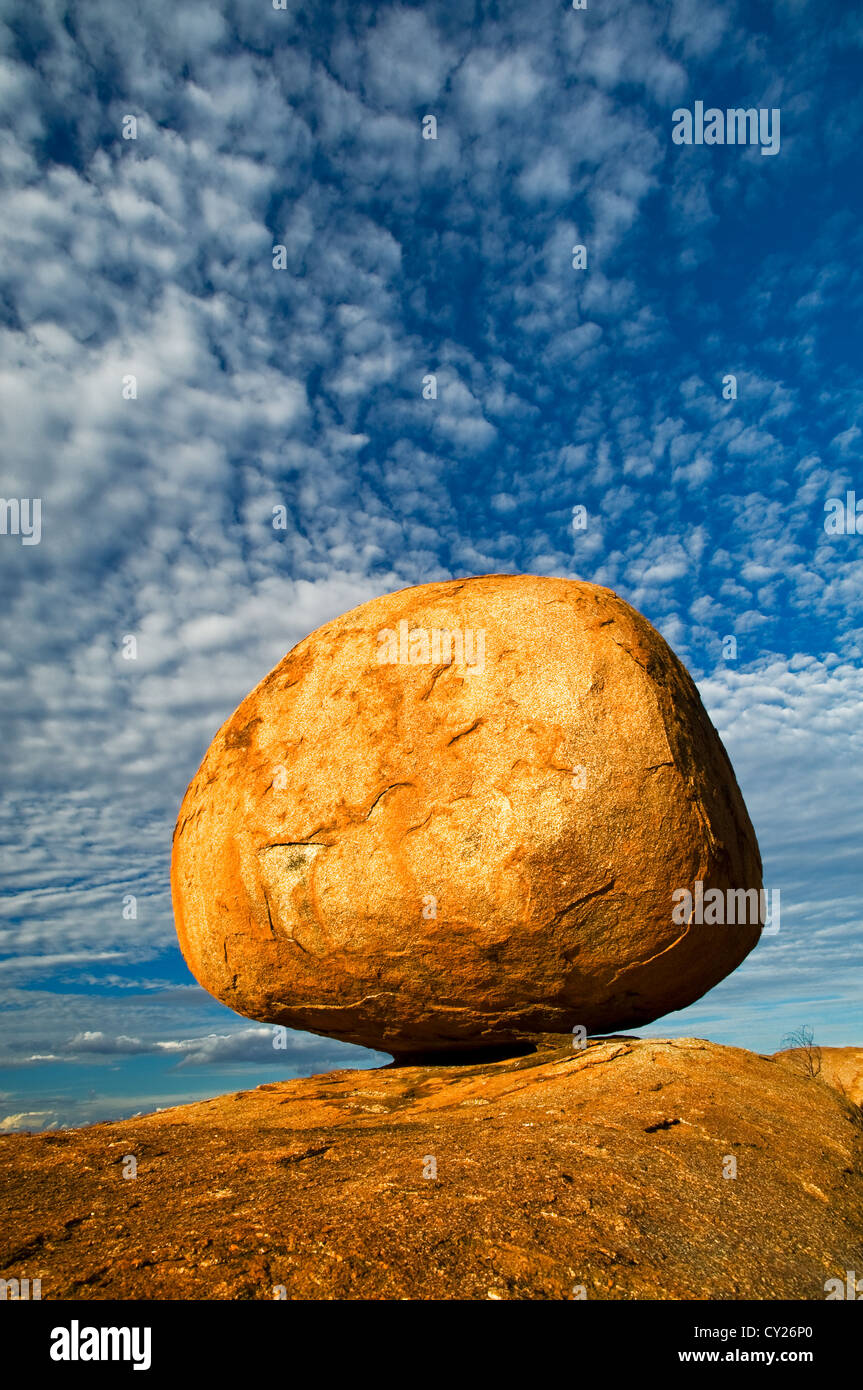 Well balanced granite boulder of the Devils Marbles. Stock Photo