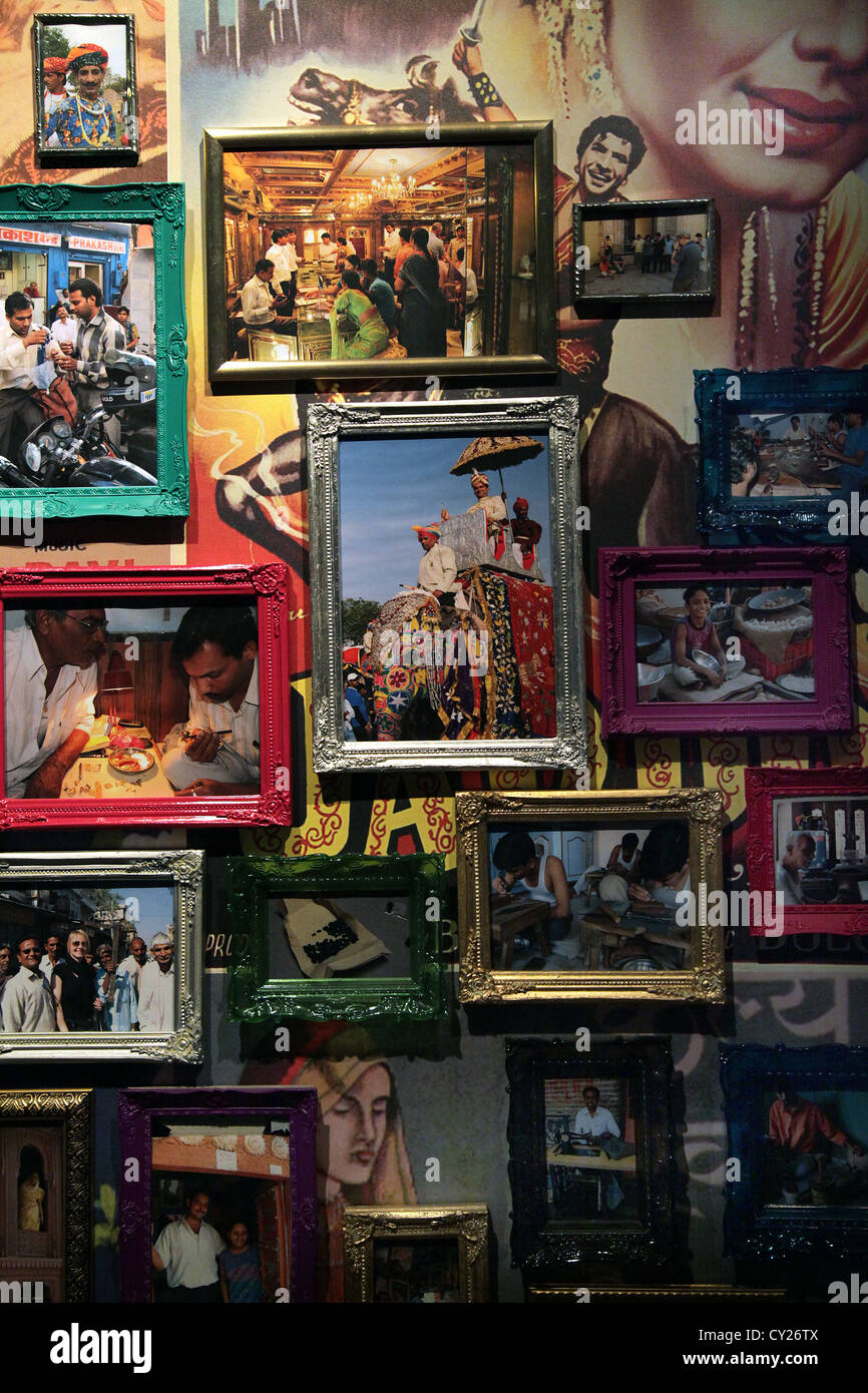 Mumbai,also known as Bombay india,family portraits on a wall. Stock Photo