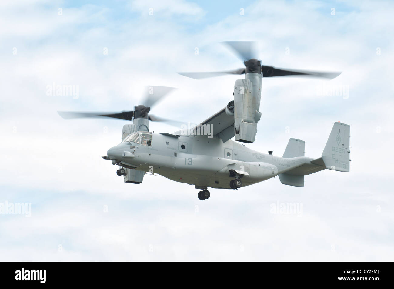 Bell Boeing V-22 Osprey Number 13 from the Marine Medium Tiltrotor Squadron 264 The Black Knights makes a slow flypast Stock Photo
