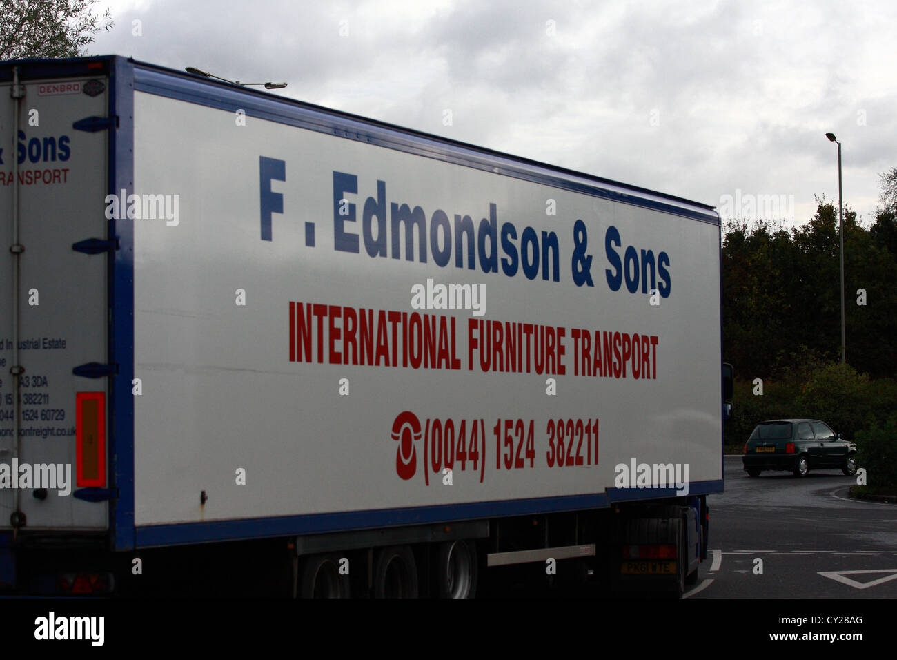 A 'F Edmondson' truck traveling along a road in England Stock Photo