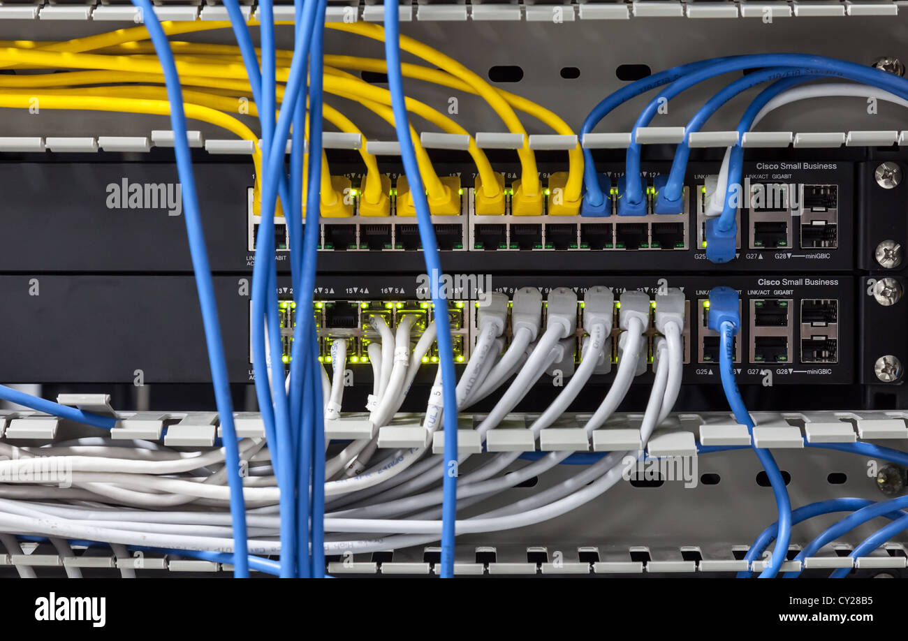 Large network hub panel with connected cables Stock Photo Alamy