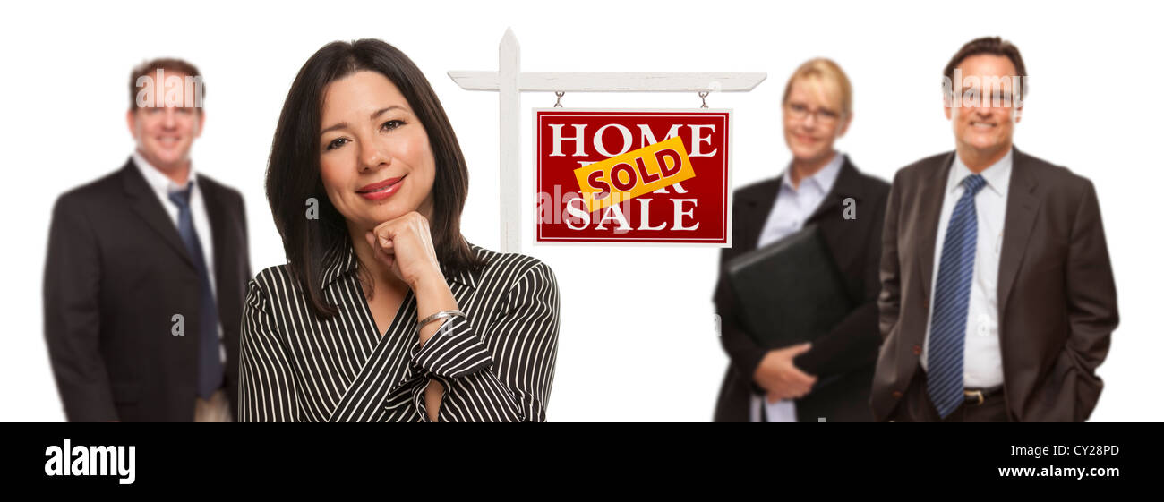 Pretty Hispanic Woman and Other People Behind in Front of Sold Home For ...