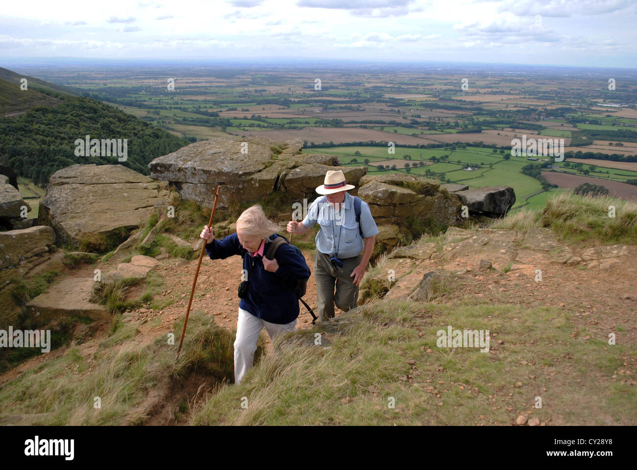 Husband and wife hiking at the Wainstones, cleveland hills. Stock Photo