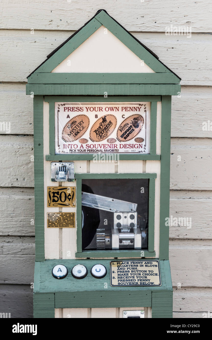 Knotts Berry Farm, California, USA. Press a souvenir penny machine