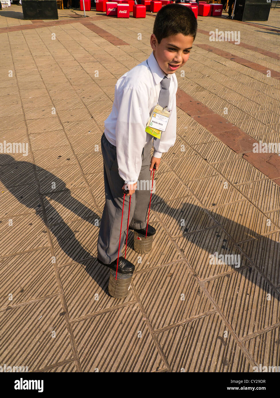 Boy on homemade stilts at Junior Achievement in Asunción, Paraguay. Stock Photo