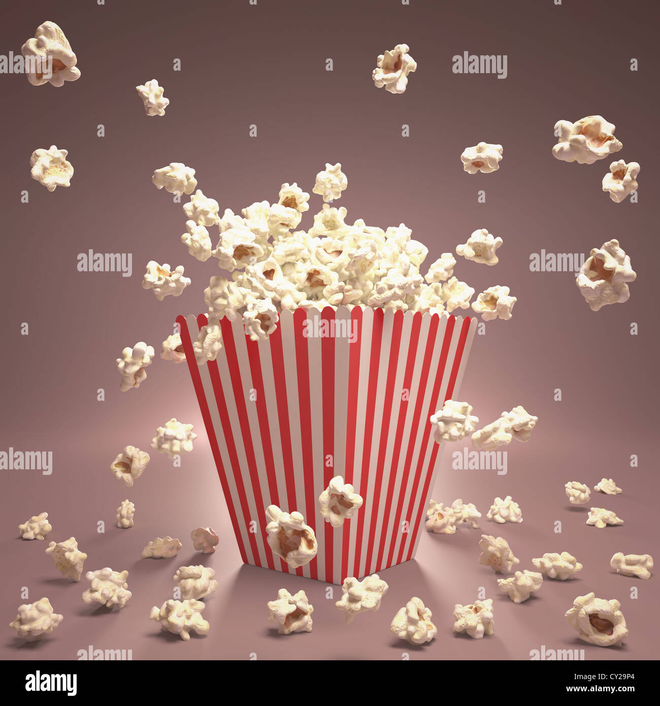Popcorn exploding inside the packaging striped. Stock Photo