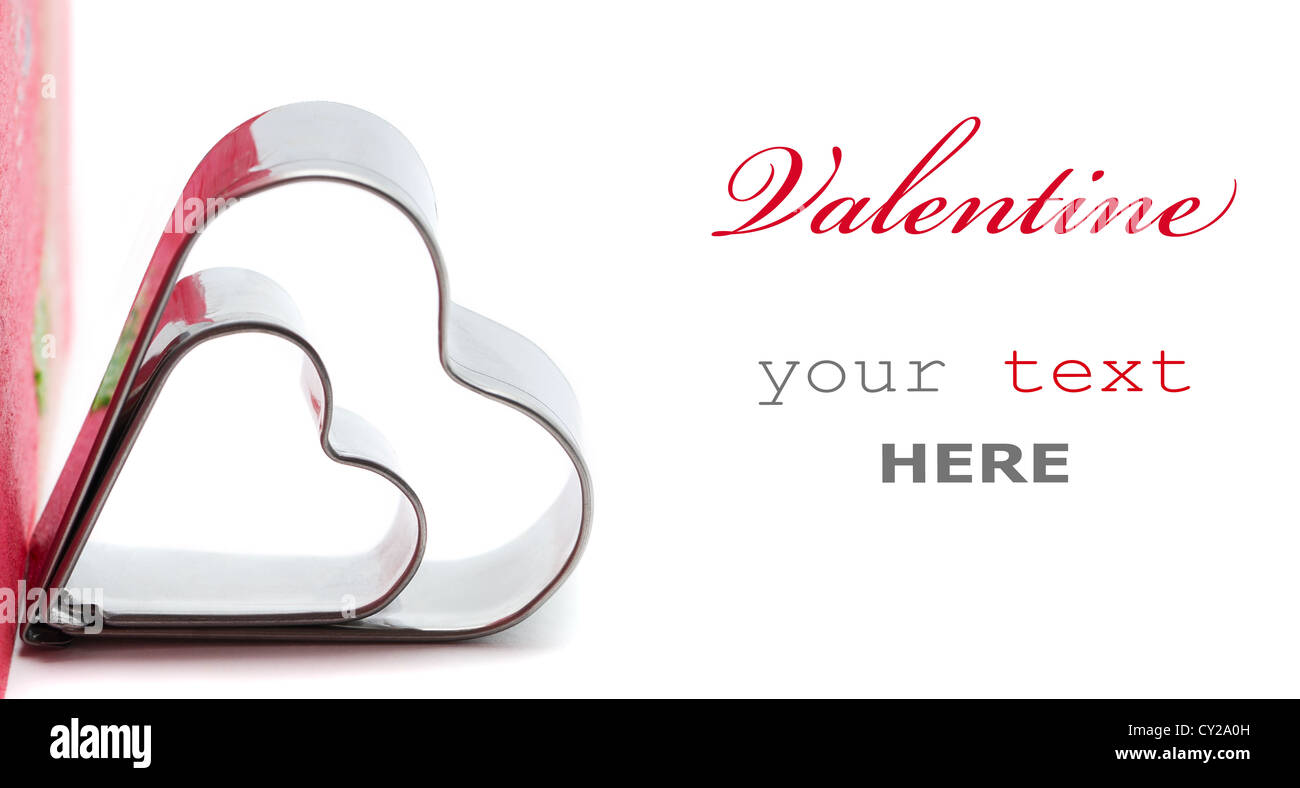 Two metal hearts with text isolated on white background (with copy ...