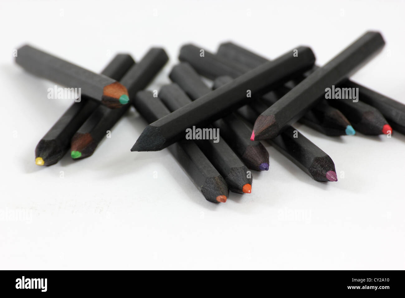 black coloured pencils against a white background, group of, studio shot, photoarkive Stock Photo