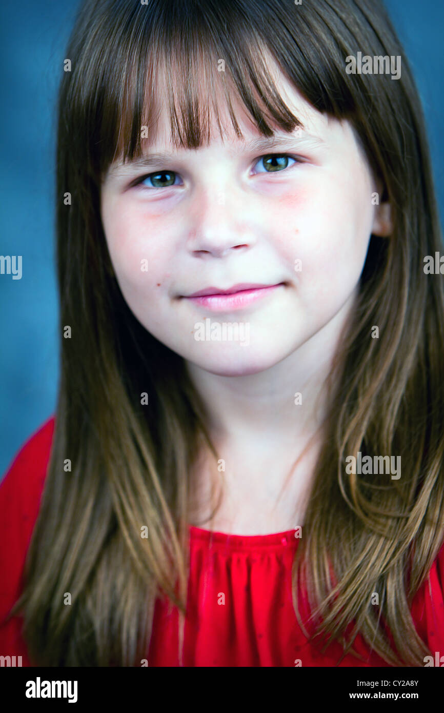 Close up of a young girl looking at camera Stock Photo - Alamy