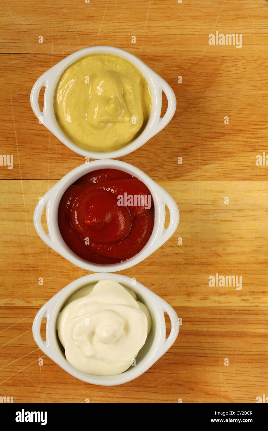 three kinds of sauces, mustard, ketchup and mayonnaise Stock Photo Alamy