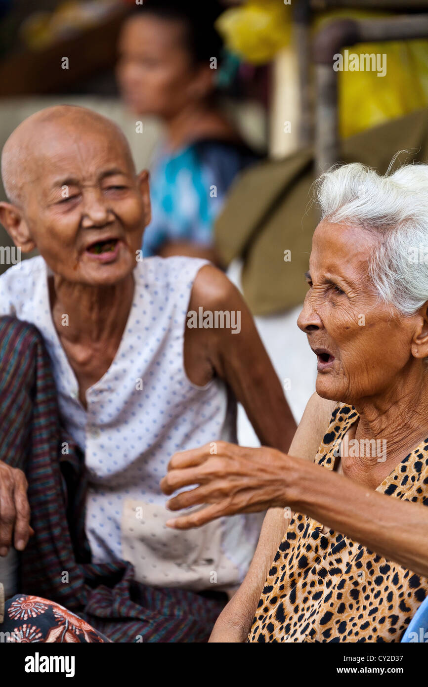 Old Women talking in the Streets of Phnom Penh, Cambodia Stock Photo