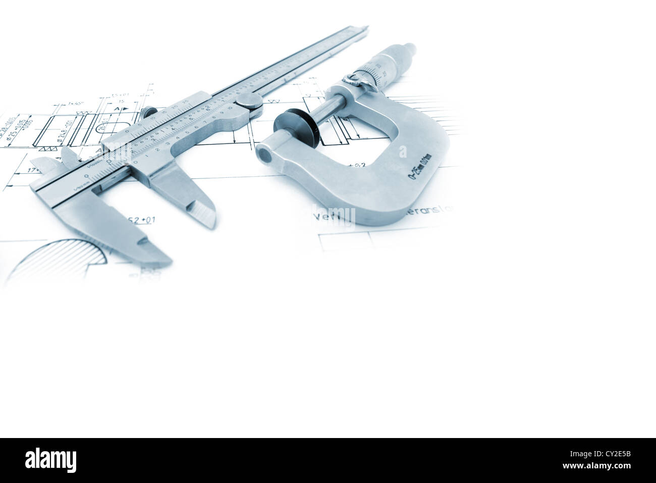 Caliper and Micrometer on blueprint horizontal close up with copyspace. Shallow depth of field Stock Photo