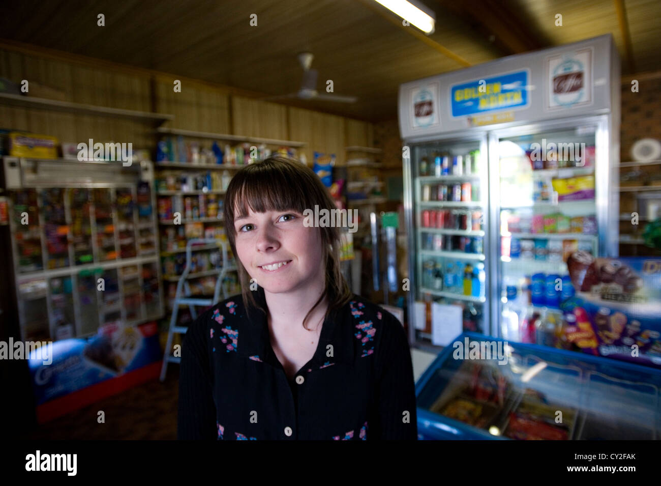 young woman in old shop Stock Photo