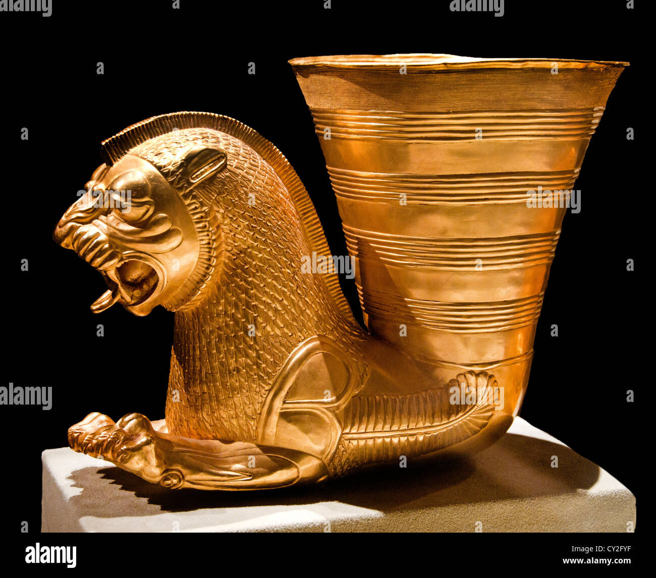 Persian gold rhyton vessel terminating forepart of a fantastic leonine ...