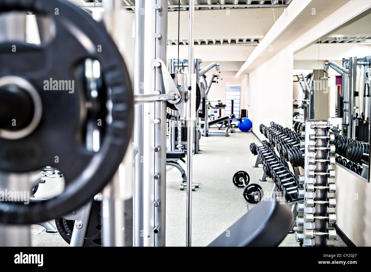 diverse equipment and machines at the gym room Stock Photo Alamy