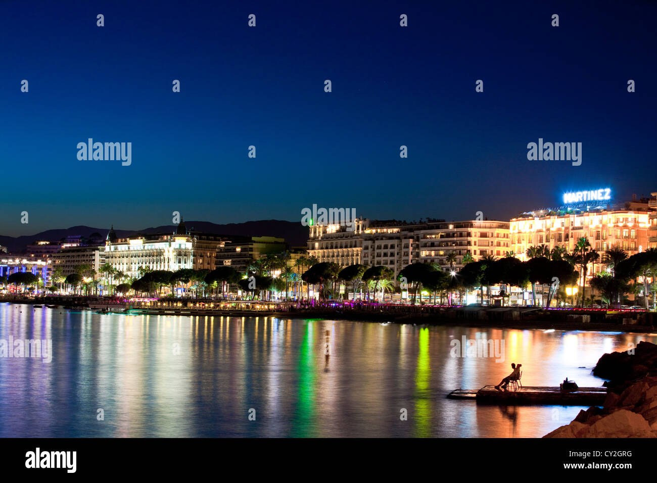 The famous art deco style Grand Hotel Martinez and Carlton on the Croisette at Cannes at dusk, France Stock Photo