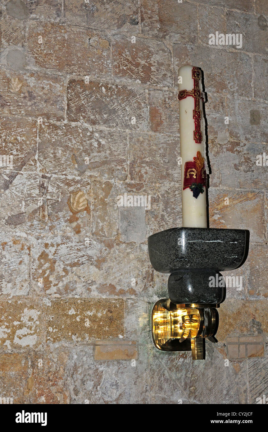 Paschal candle in maquette of the font, (designed by John Skelton) Cathedral of The Holy Trinity, Chichester. Stock Photo