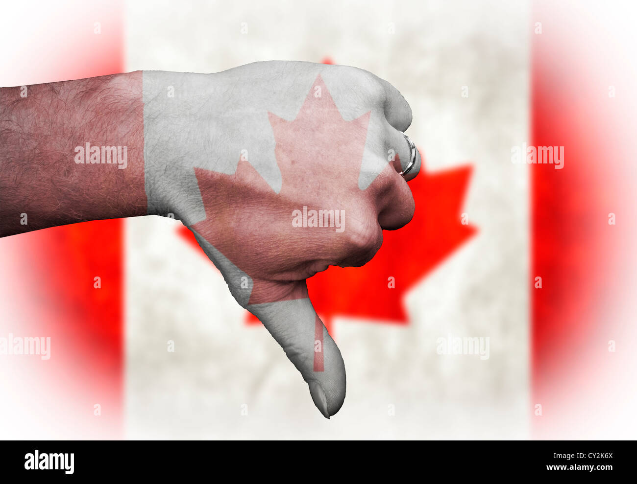 Thumbs down to the Canadians Canada, sporting metaphor in rugby football all national sports team and derogatory slur to people. Stock Photo