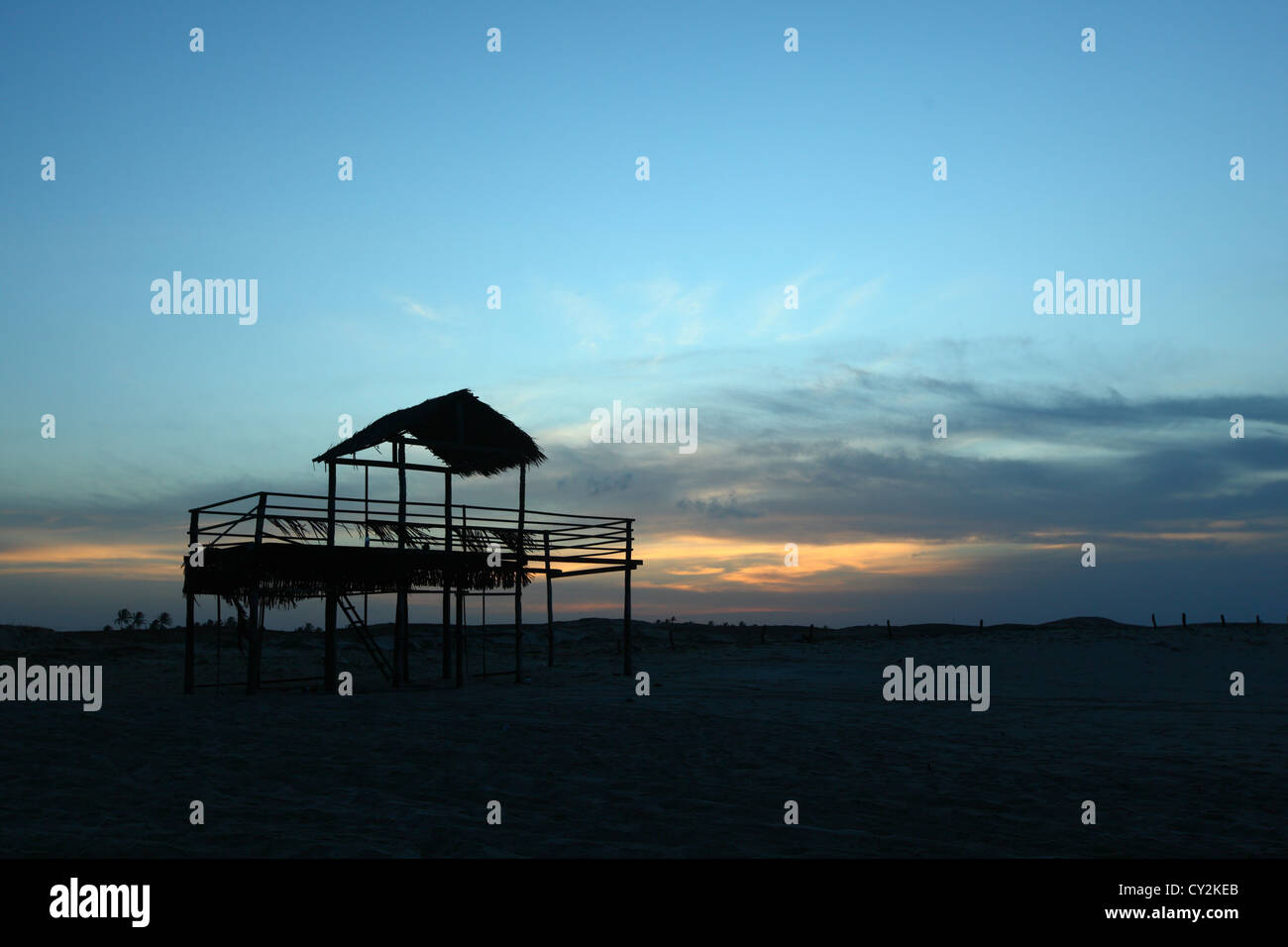 Awning In Sand Near Water Stock Photo - Alamy