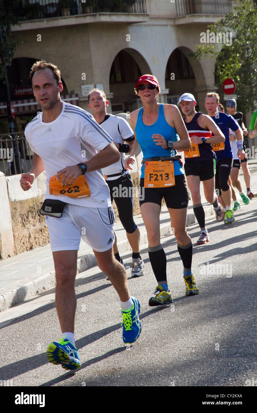 Marathon runners race athletes running on road Palma de Mallorca Spain 2012 Stock Photo