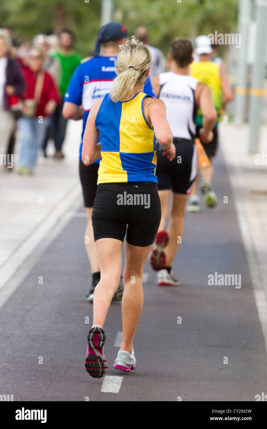 Marathon Sweden woman runners race athletes running on track Palma de