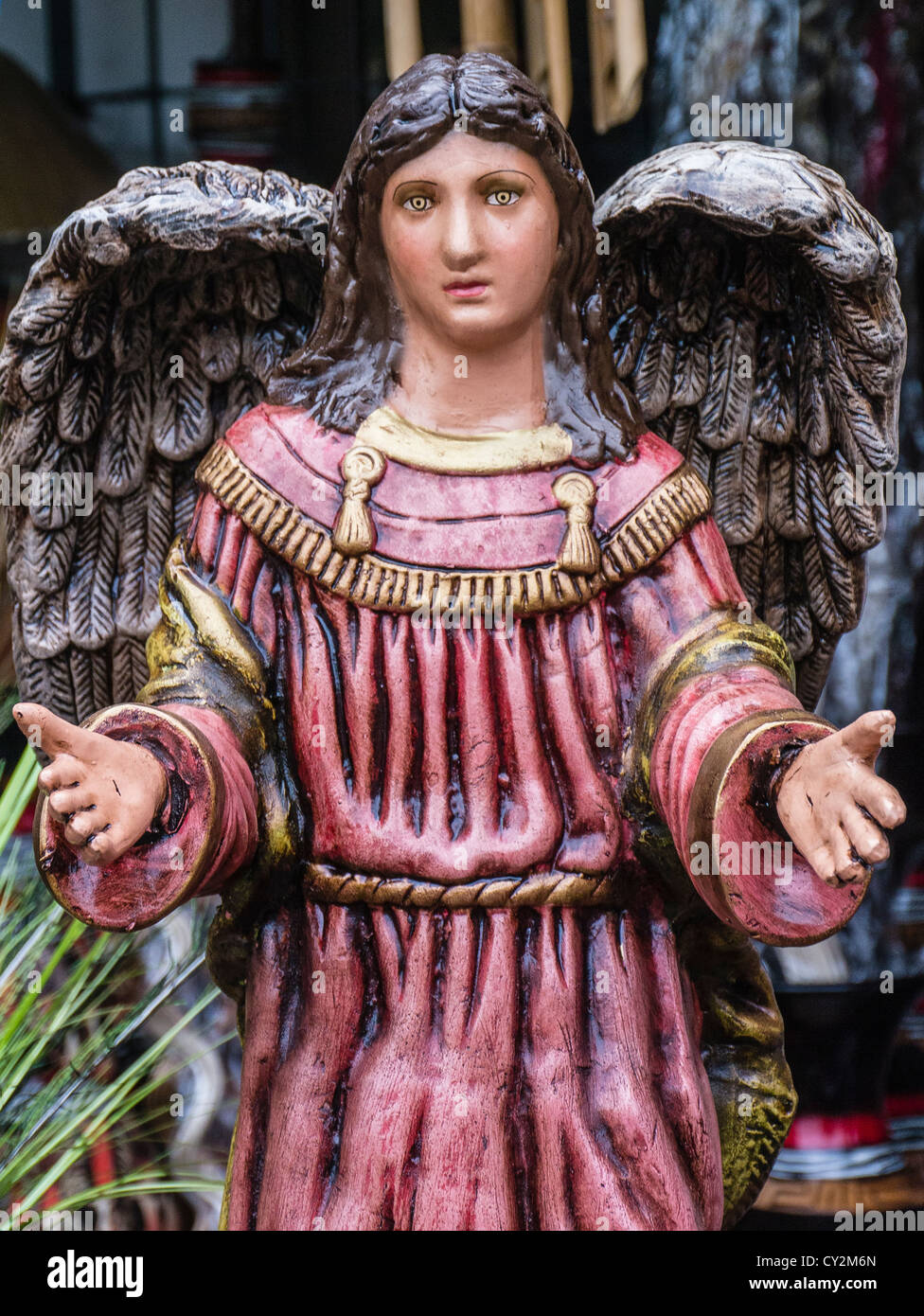 Kitsch lawn art for sale in the form of a angel figurine at a street market in Asunción Paraguay. Stock Photo