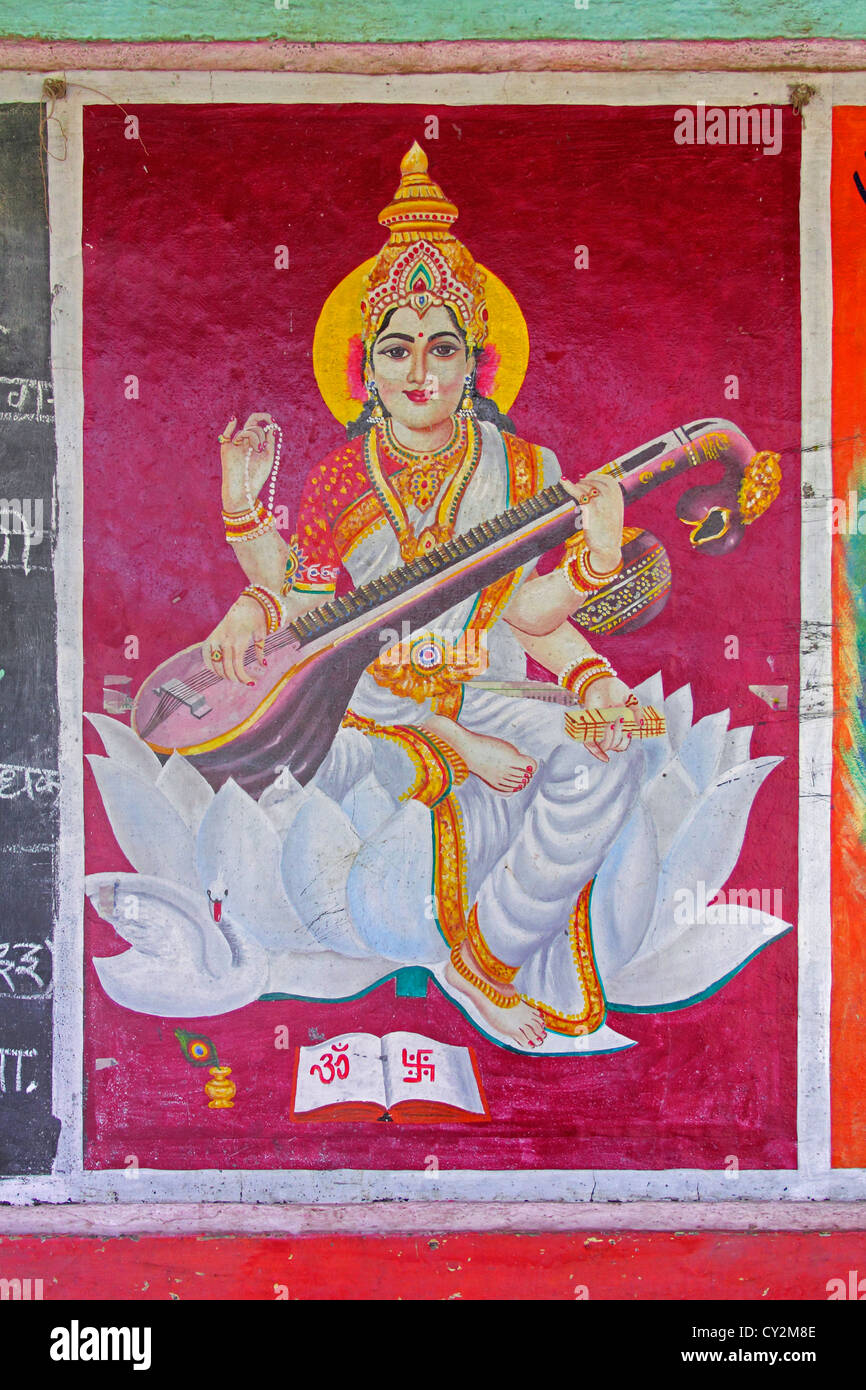 Painting of sarasvati, goddess of speech and eloquence drawing on a slate, India Stock Photo