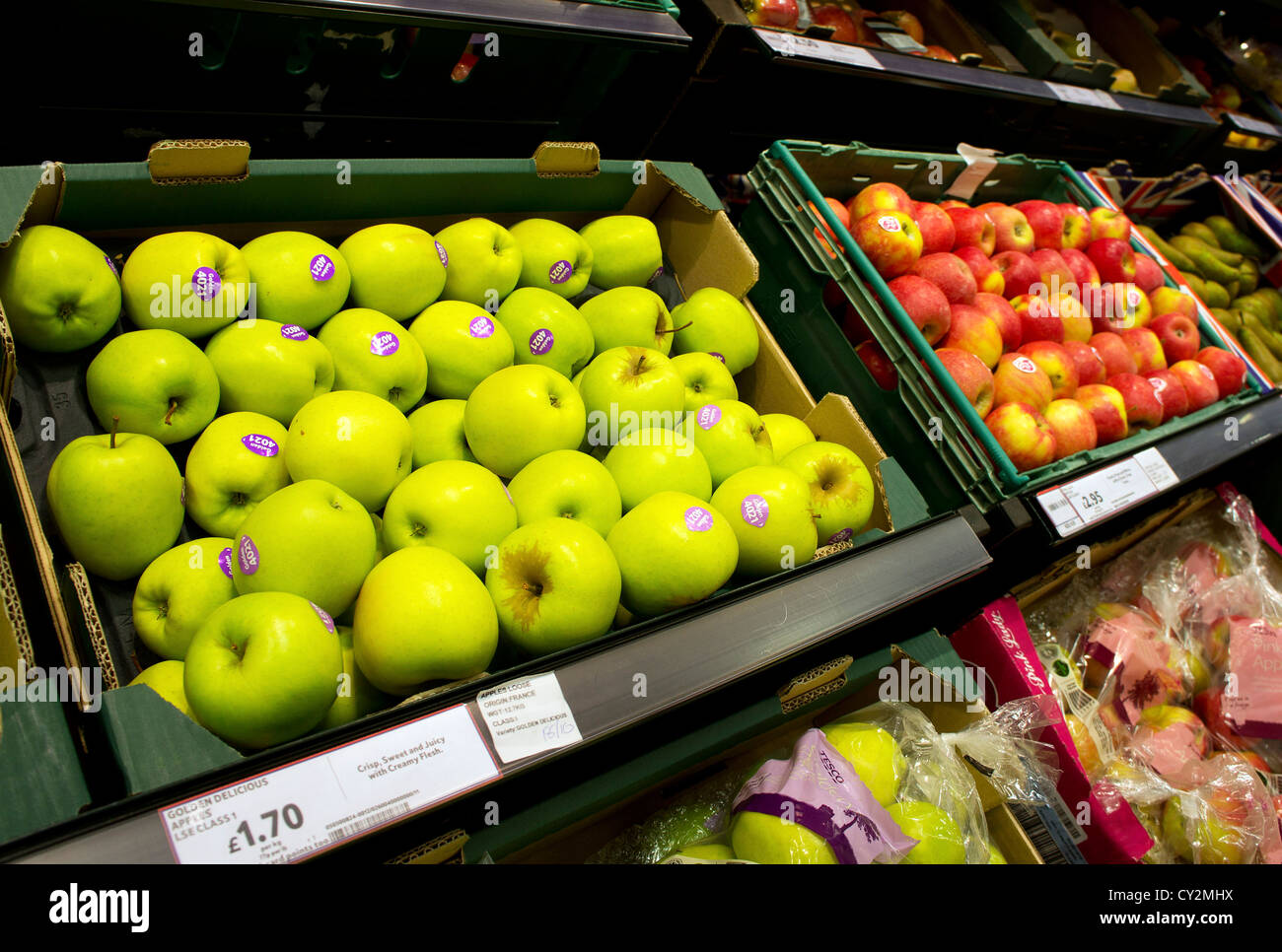 Golden Delicious apples in a uk supermarket Stock Photo