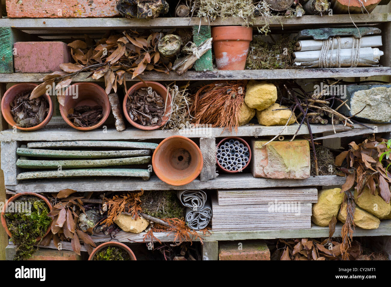 Garden bug 'hotel' made from old pallets, and recycled items Stock Photo