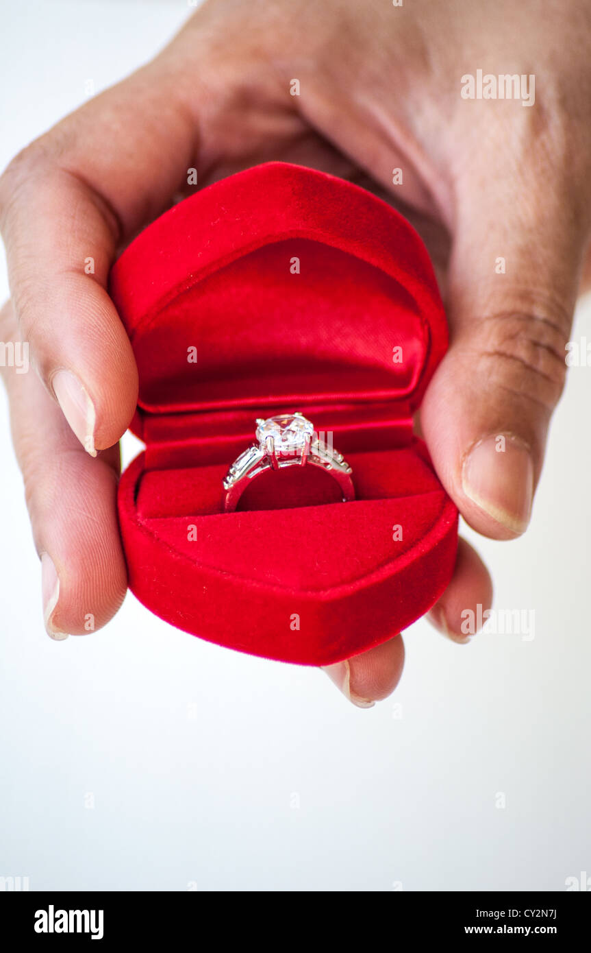 diamond ring in woman hand Stock Photo Alamy