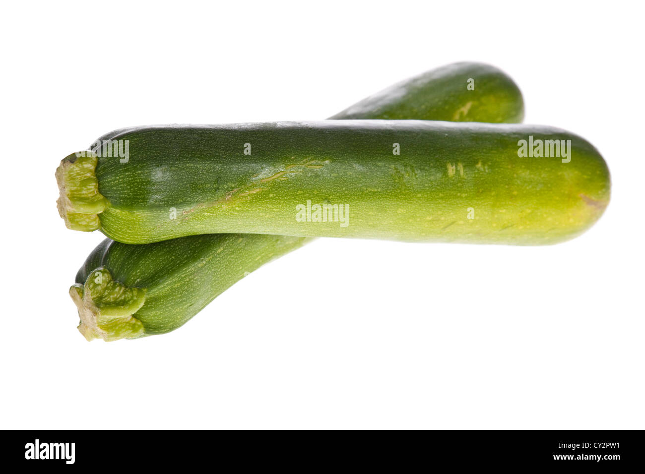 zucchinis or courgettes isolated on a white background. Stock Photo